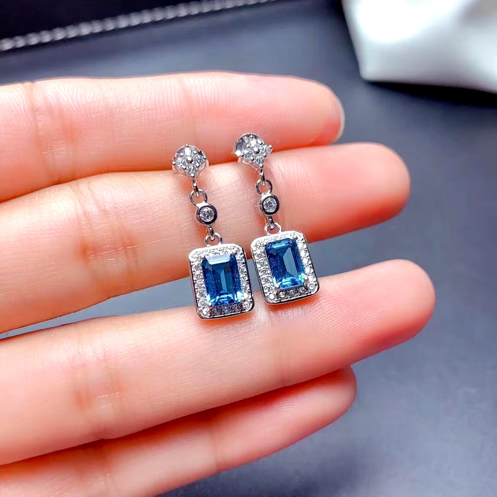 London Blue Topaz Emerald Cut Dangle Earrings, London Blue Topaz Jewelry, London Blue Topaz Cluster Stud Earrings, Women's London Blue Topaz Earrings, London Blue Topaz Jewelry, Natural London Blue Topaz Gemstone Jewelry Set, Women's London Blue Topaz Earrings, London Blue Topaz Ring, London Blue Topaz Stud Earrings, London Blue Topaz Earrings, Women's London Blue Topaz Jewelry, Sterling Silver London Blue Topaz Jewelry, December Birthstone London Blue Topaz, London Blue Topaz Spiritual Meaning