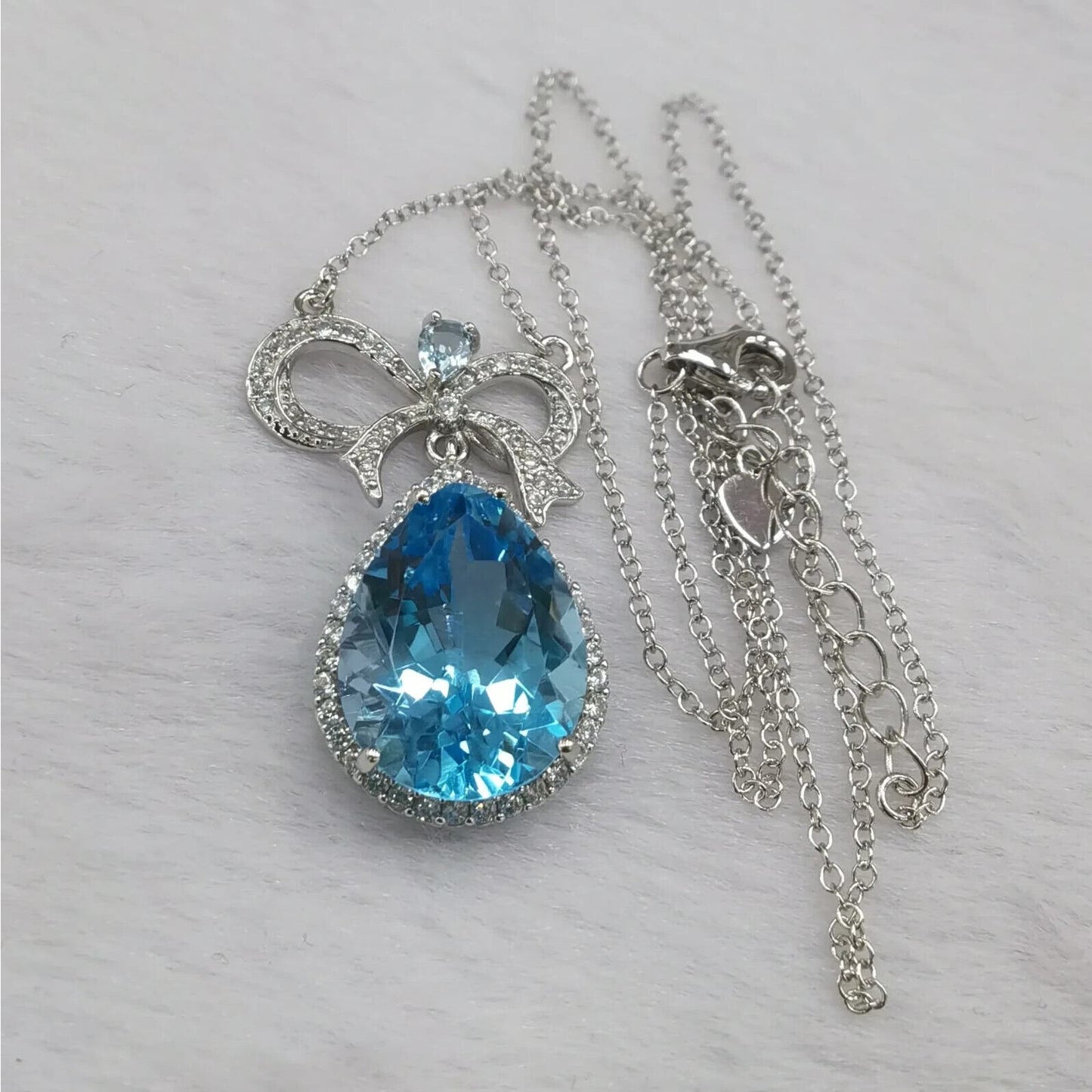 Swiss Blue Topaz Bow Tie Pendant Necklace 12x16mm