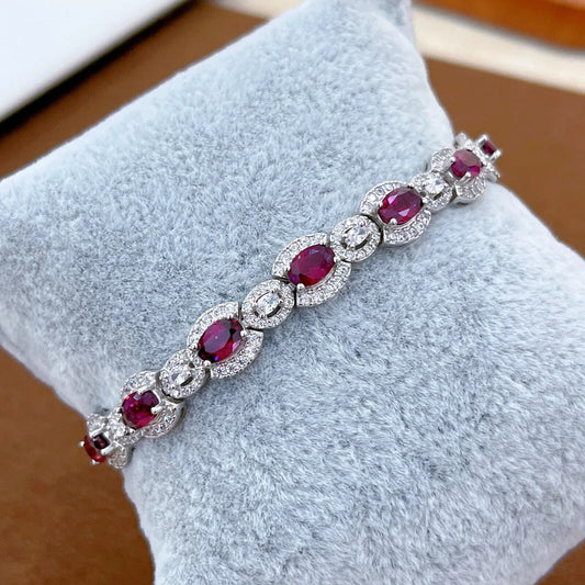 Red Garnet and Cubic Zirconia Tennis Bracelet 4x6mm Platinum